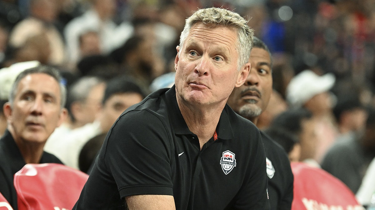 USA head coach Steve Kerr speaks to a player on the bench in the fourth quarter against Canada in the USA Basketball Showcase at T-Mobile Arena