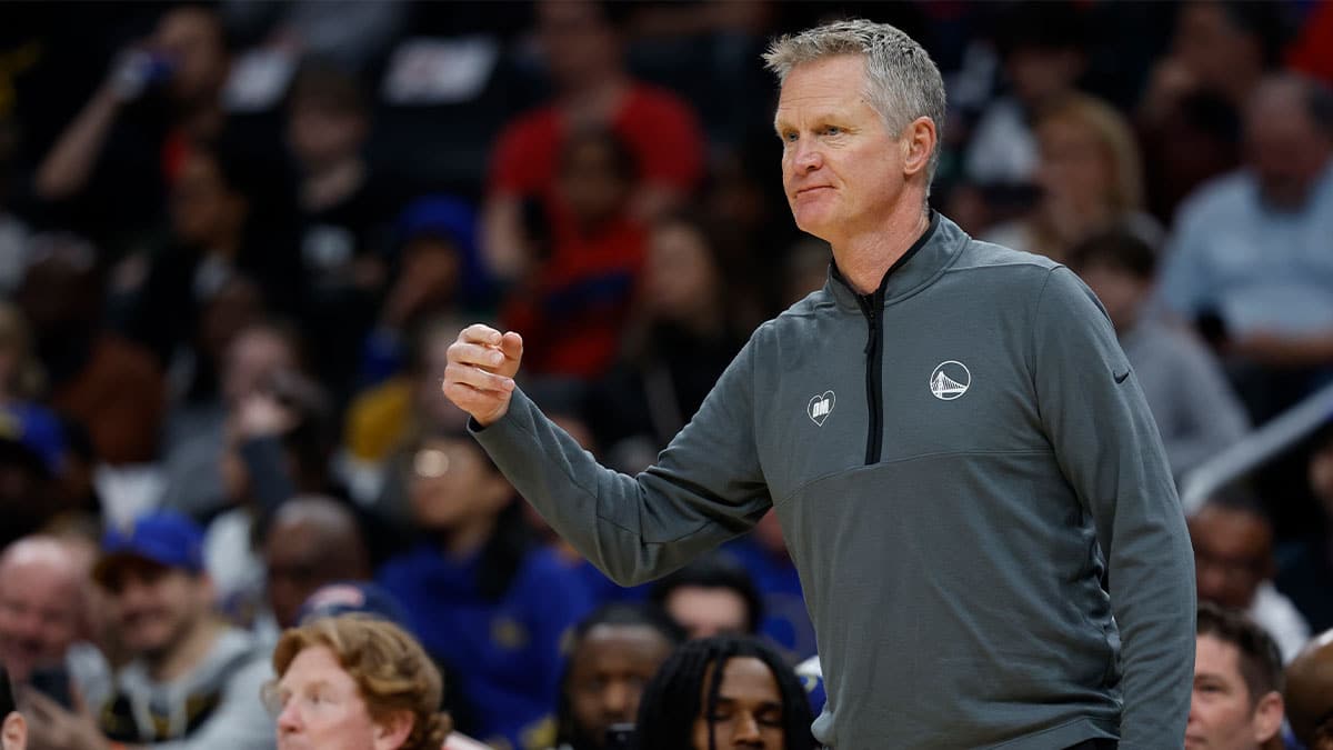 Golden State Warriors head coach Steve Kerr gestures from the bench against the Washington Wizards in the first half at Capital One Arena