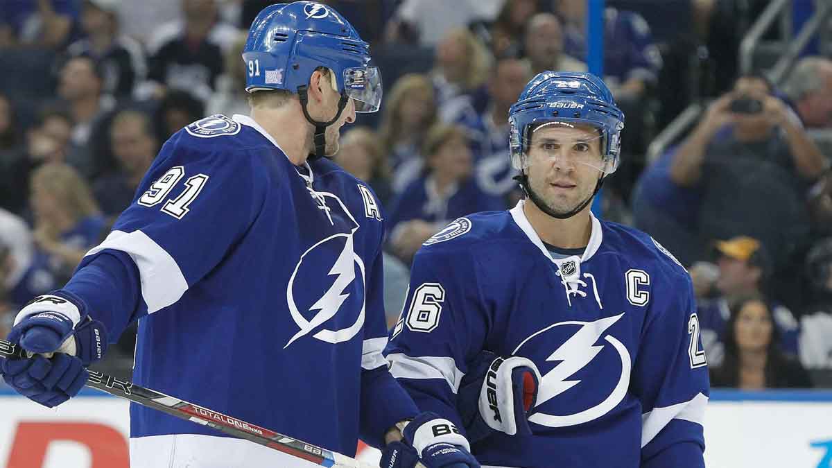 Tampa Bay Lightning right wing Martin St. Louis (26) and center Steven Stamkos (91) talk against the Florida Panthers during the third period at Tampa Bay Times Forum. Tampa Bay Lightning defeated the Florida Panthers 7-2.