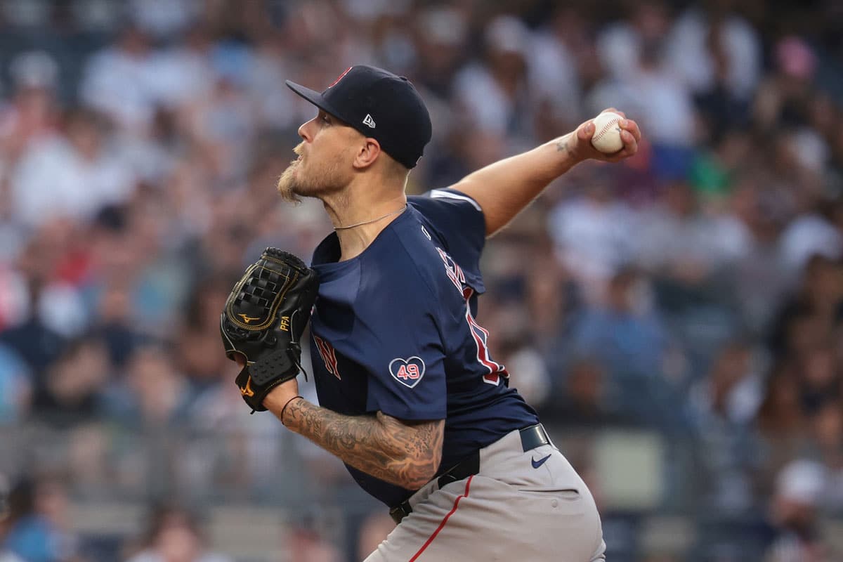 Boston Red Sox starting pitcher Kutter Crawford (50) delivers a pitch during the first inning against the New York Yankees at Yankee Stadium.