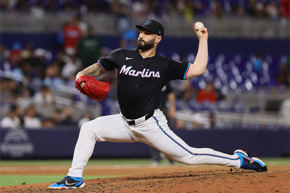 Miami Marlins relief pitcher Tanner Scott (66) delivers a pitch against the New York Mets during the ninth inning at loanDepot Park.