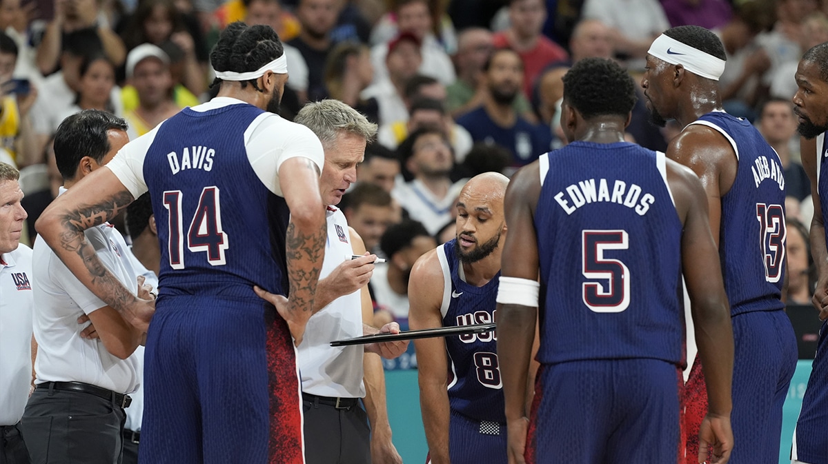 United States head coach Steve Kerr talks to the team during a timeout in the first quarter against Serbia during the Paris 2024 Olympic Summer Games at Stade Pierre-Mauroy.