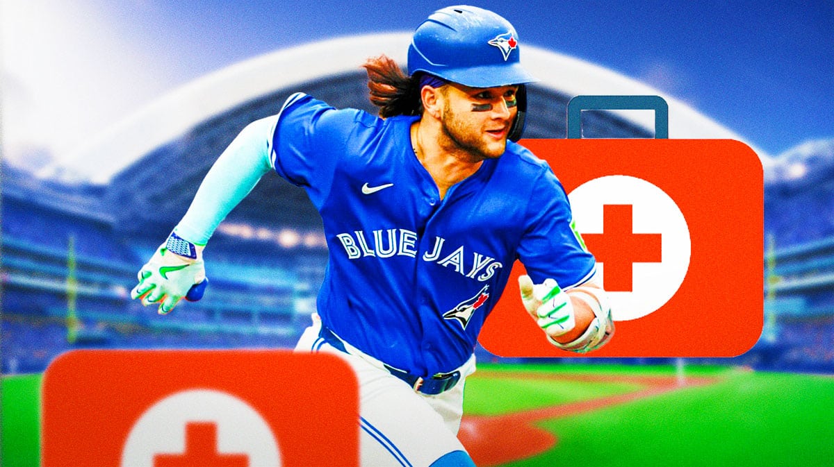 Blue Jays' Bo Bichette, medical kits next to him, Rogers Centre in back