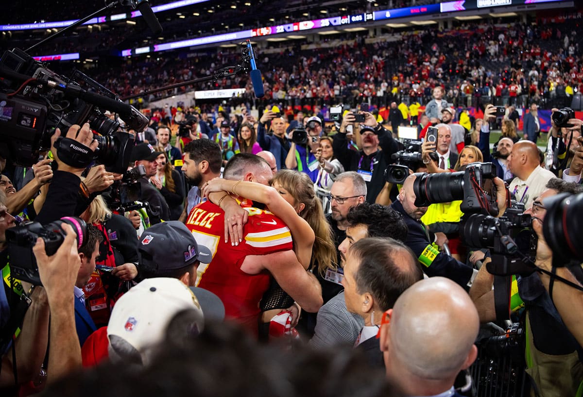 Travis Kelce, Taylor Swift celebrating the Chiefs win at Super Bowl LVIII.