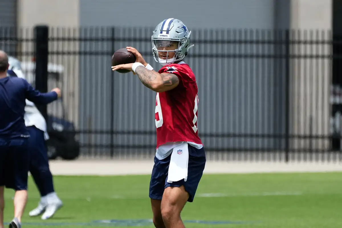 Jun 5, 2024; Frisco, TX, USA; Dallas Cowboys quarterback Trey Lance (19) goes through a drill during practice at the Ford Center at the Star Training Facility in Frisco, Texas.