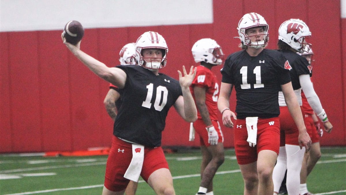 Wisconsin quarterback Tyler Van Dyke throws a pass during spring practice at the McClain Center