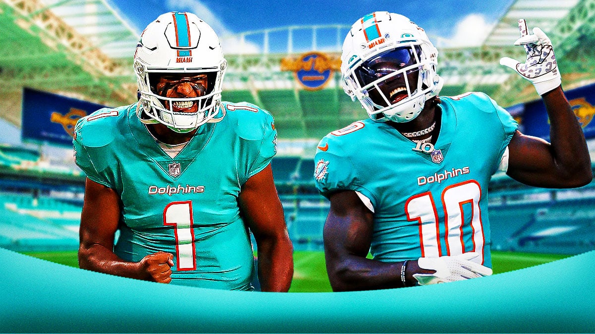 Miami Dolphins stars Tyreek Hill and Tua Tagovailoa in front of Hard Rock Stadium.
