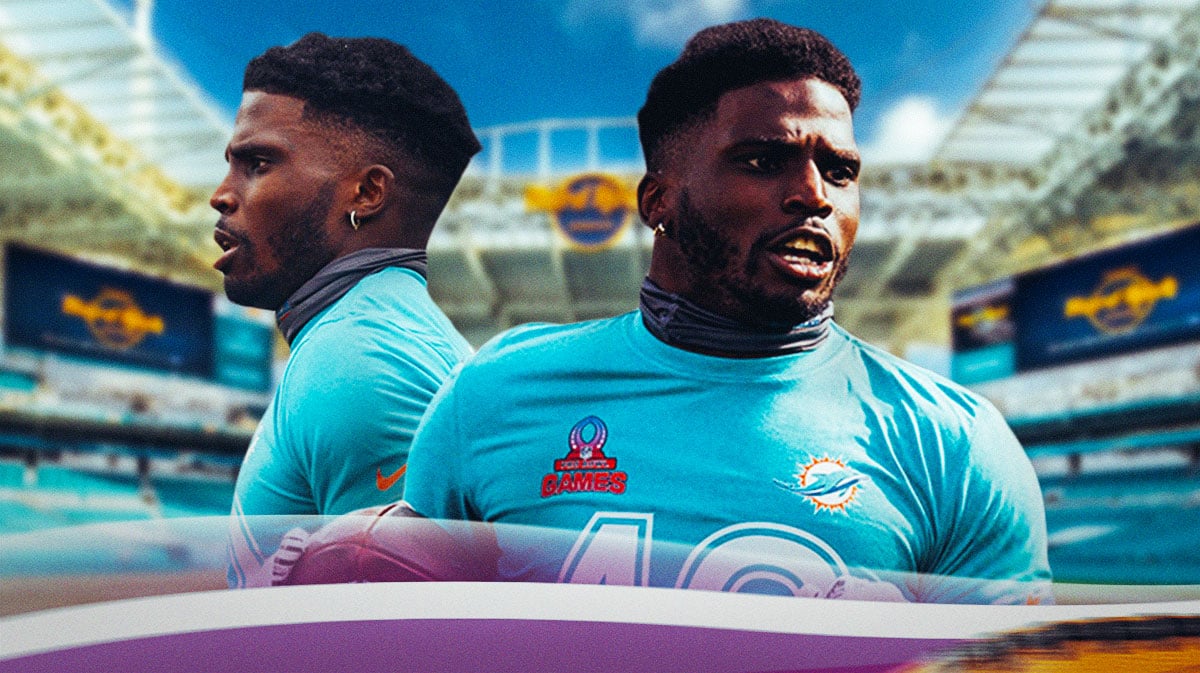 Miami Dolphins star Tyreek Hill in front of Hard Rock Stadium.
