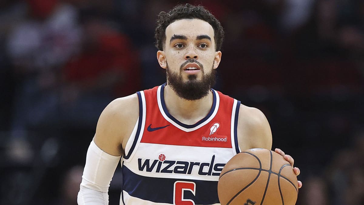 Washington Wizards guard Tyus Jones (5) brings the ball up the court during the third quarter against the Houston Rockets at Toyota Center.