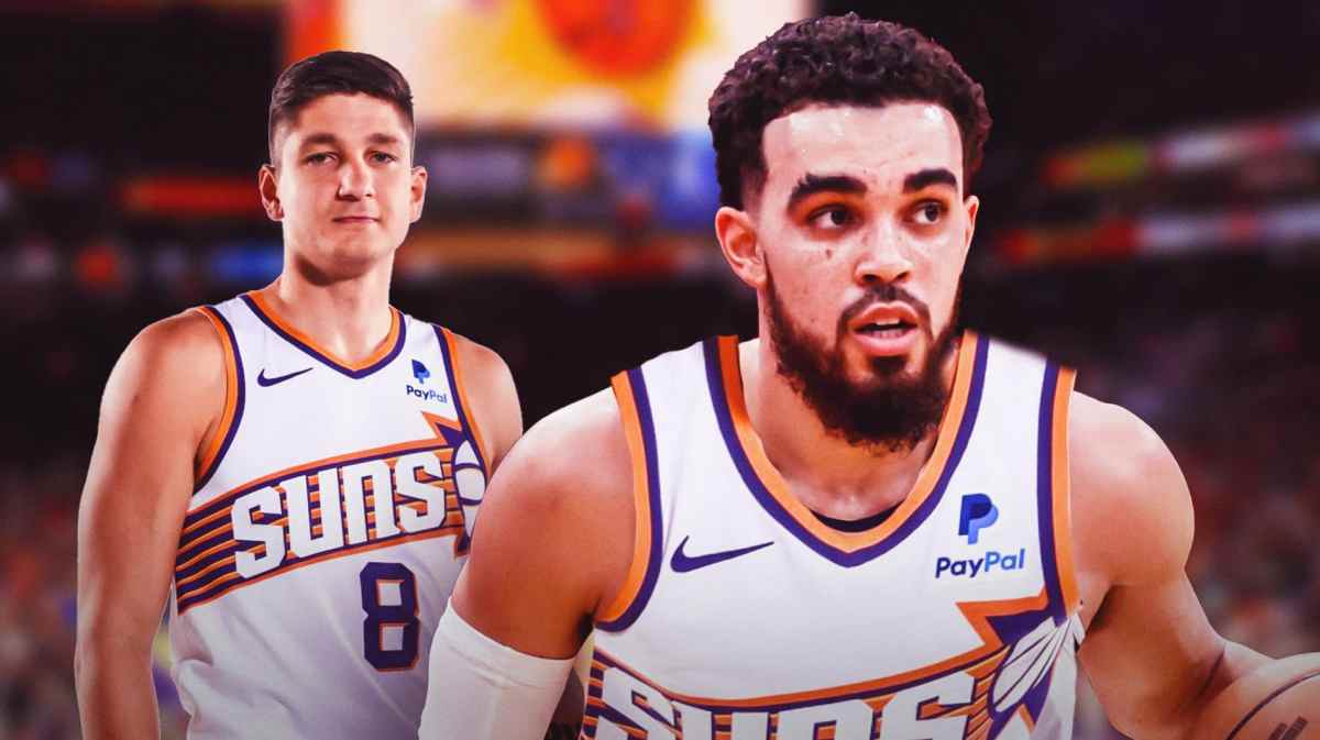 Tyus Jones in Suns jersey beside Grayson Allen