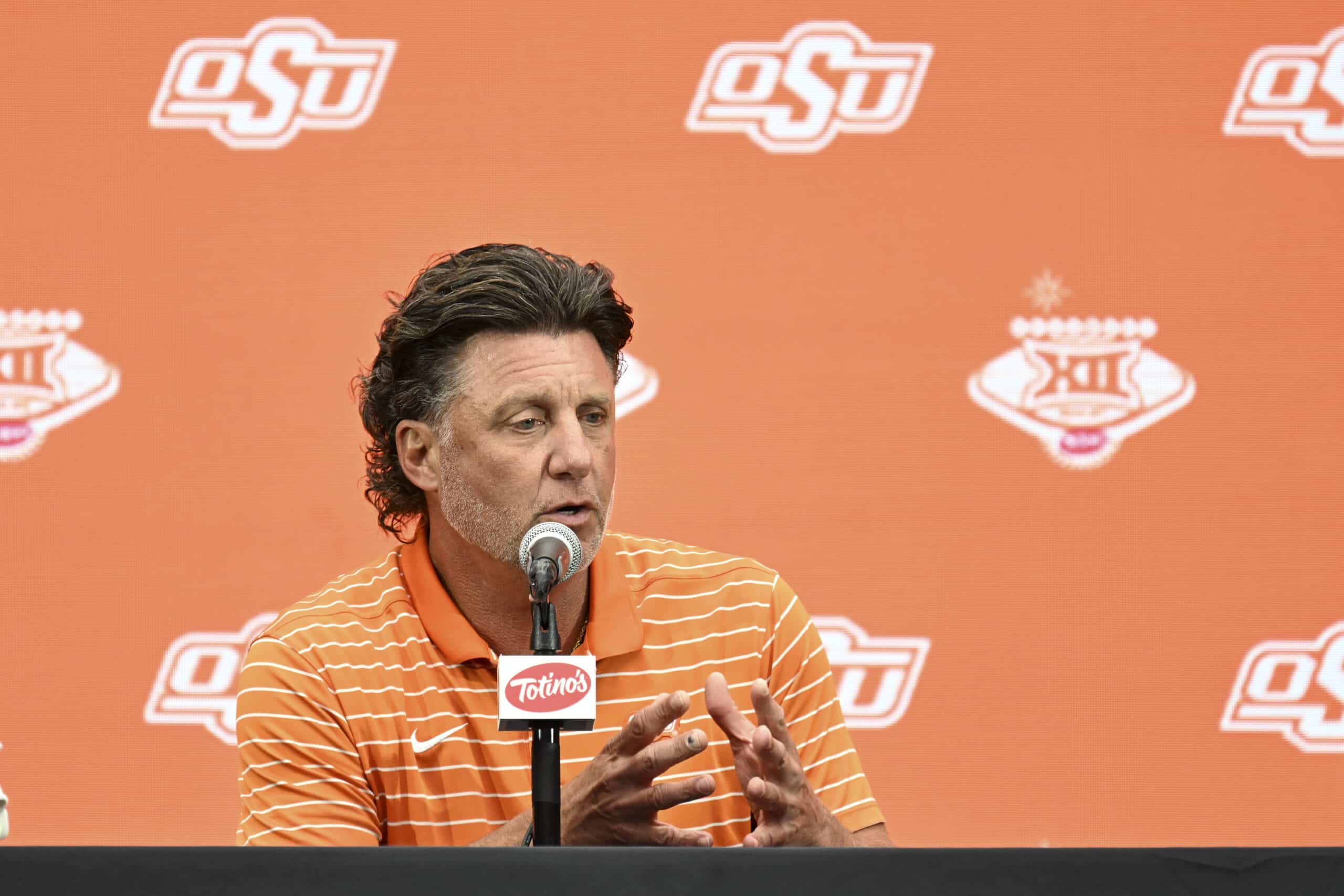 Jul 9, 2024; Las Vegas, NV, USA; Oklahoma State Cowboys head coach Mike Gundy speaks to the media during the Big 12 Media Days at Allegiant Stadium. 