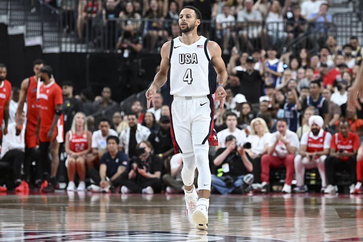 USA guard Steph Curry (4) celebrates scoring on Canada during the first quarter of the USA Basketball Showcase at T-Mobile Arena. 