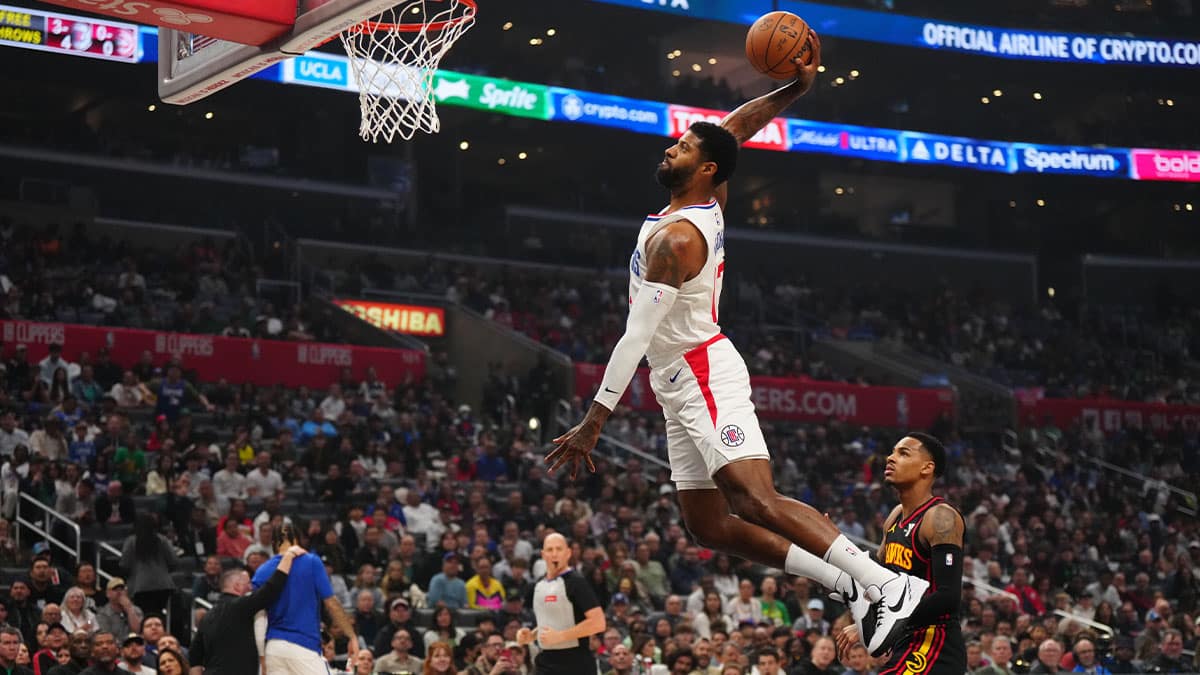 LA Clippers forward Paul George (13) dunks the ball against the Atlanta Hawks in the first half at Crypto.com Arena.