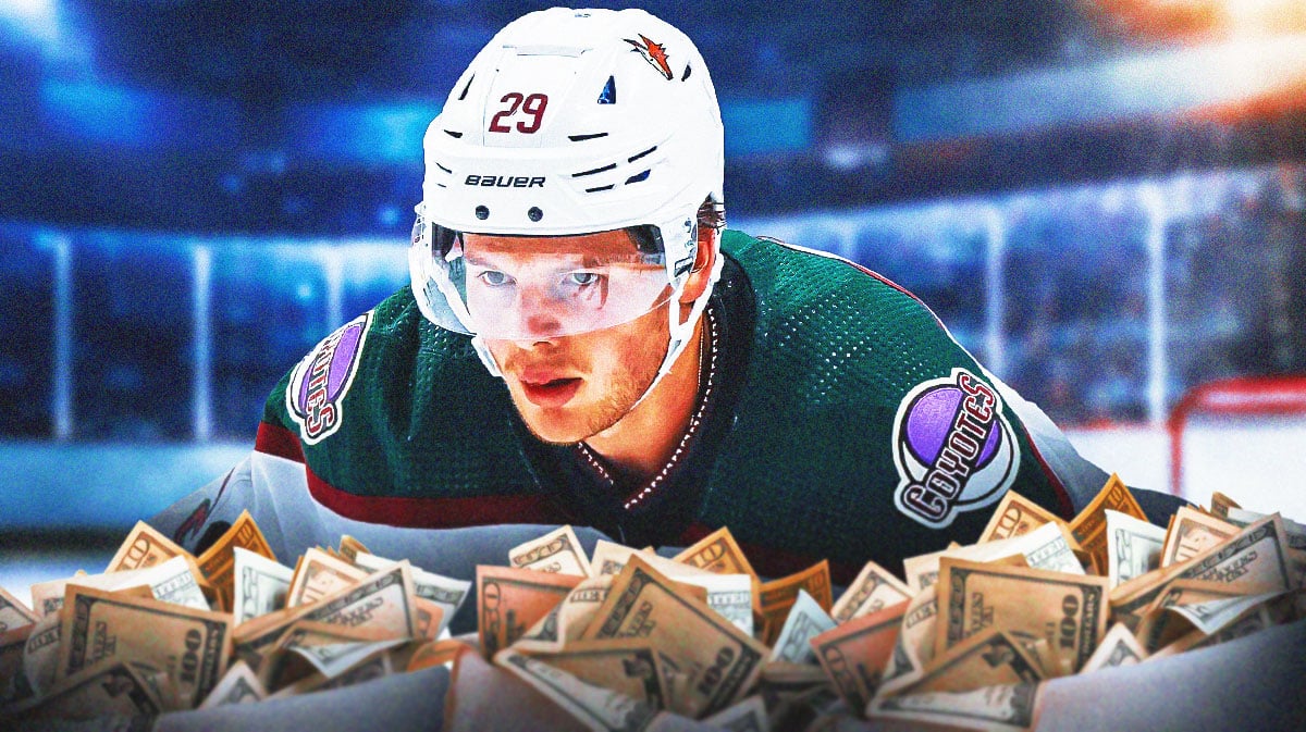 Barrett Hayton in image looking happy, money in image to represent contract, Utah Hockey Club logo, hockey rink in background