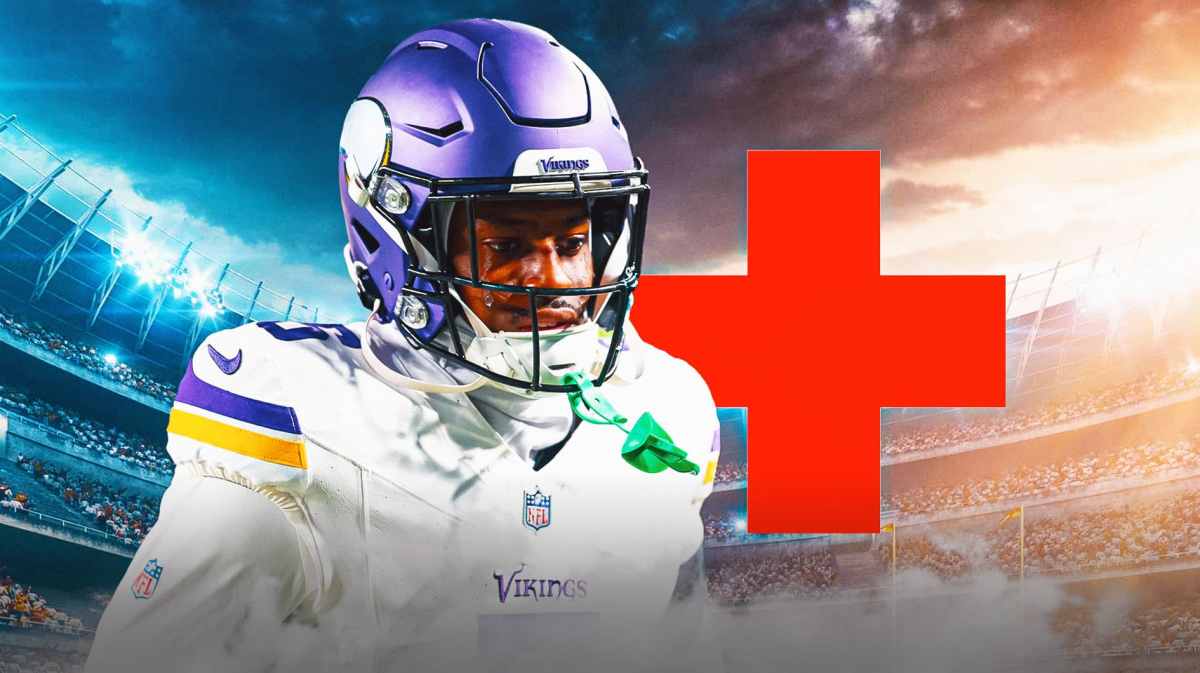 Mekhi Blackmon cries with hospital sign next to him