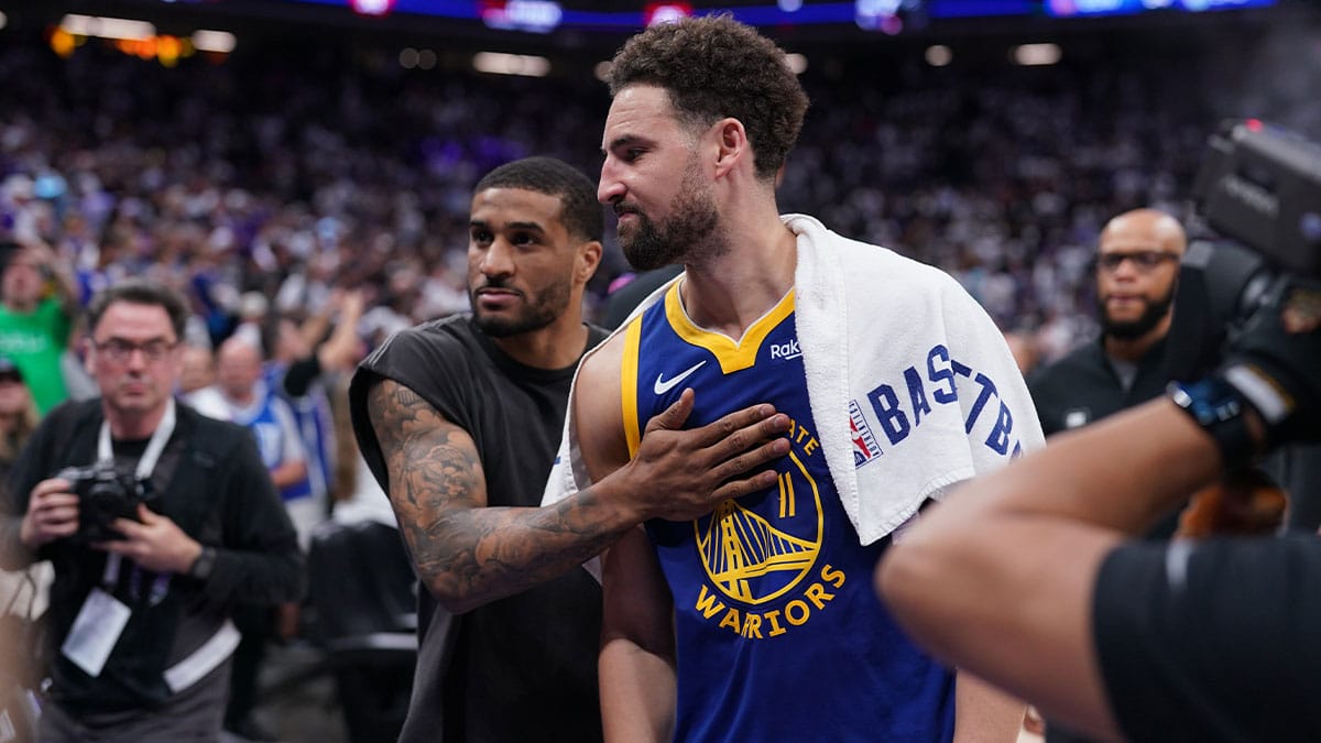 ; Golden State Warriors guard Klay Thompson (11) and guard Gary Payton II (0) walk towards the locker room after the Warriors lost to the Sacramento Kings 
