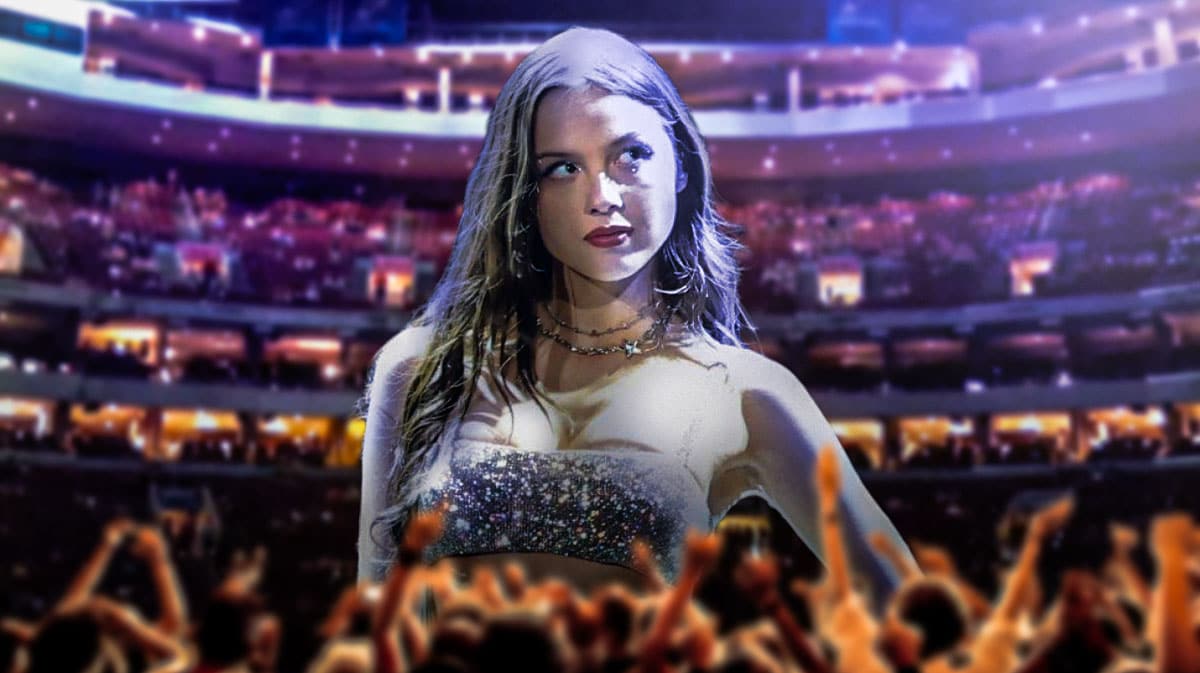 Olivia Rodrigo, who will resume the 2024 Guts World Tour on July 19, 2024, with a show at Well Fargo Center (seen in background).