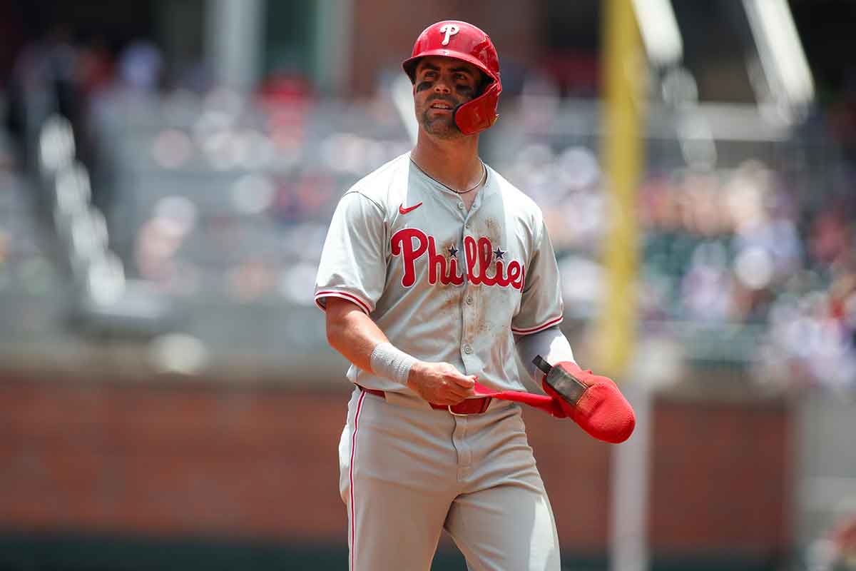 Philadelphia Phillies left fielder Whit Merrifield (9) after an inning against the Atlanta Braves in the second inning at Truist Park.