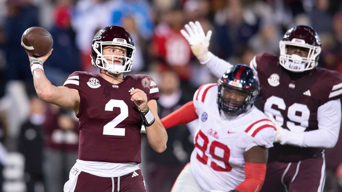 Mississippi State QB Will Rogers (2) passes against Ole Miss during the second half of the Egg Bowl at Davis Wade Stadium 