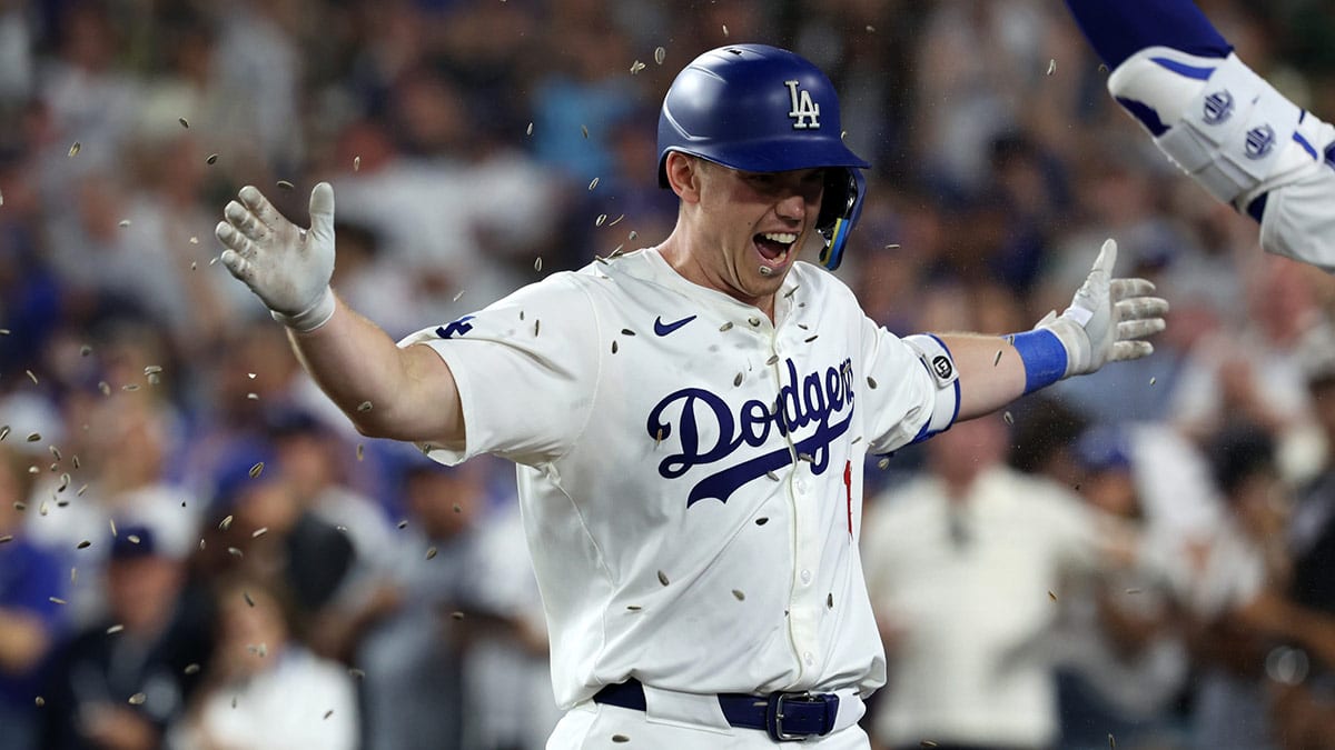 Los Angeles Dodgers catcher Will Smith (16) reacts after hitting a third home run of the game during the seventh inning against the Milwaukee Brewers at Dodger Stadium.