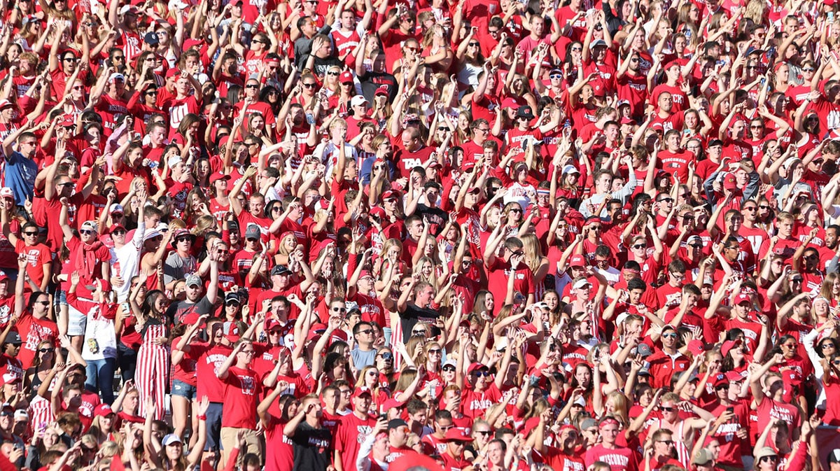 Wisconsin Badger fans celebrate "Jump Around" before the start of the fourth quarter during the game against the Akron Zips at Camp Randall Stadium. Wisconsin defeated Akron 54-10.