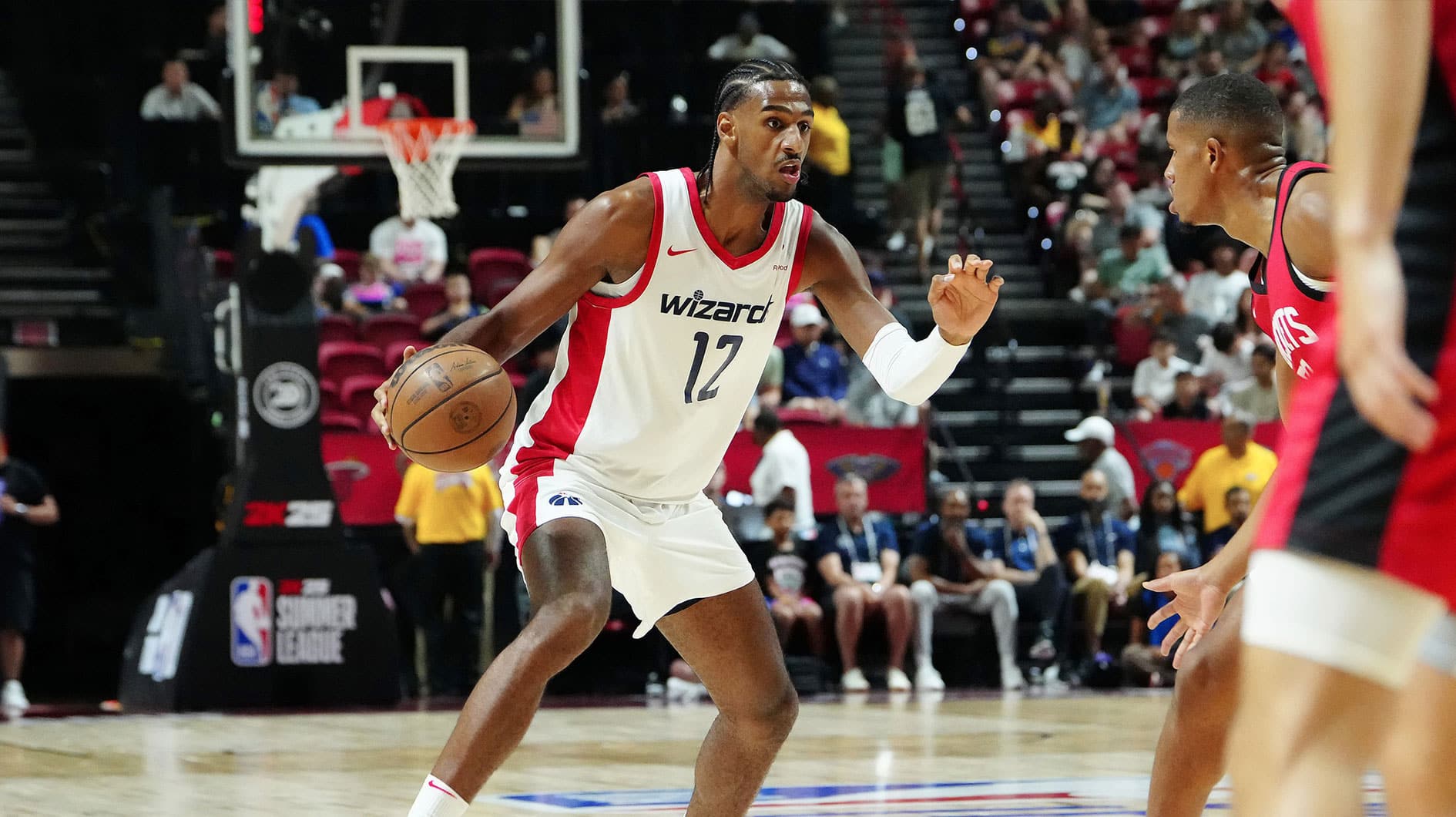 Washington Wizards forward Alex Sarr (12) dribbles against the Houston Rockets during the first quarter at Thomas & Mack Center. 