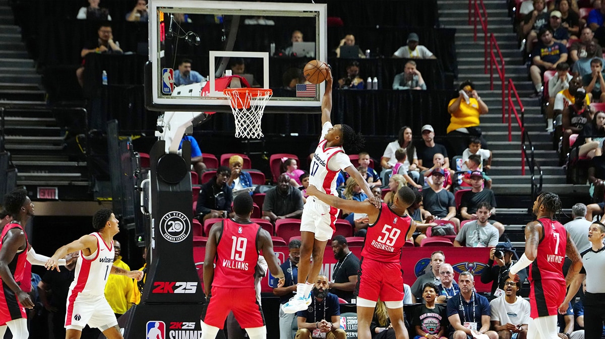 Washington Wizards guard Bub Carrington (17) dunks against the Houston Rockets during the fourth quarter at Thomas & Mack Center.