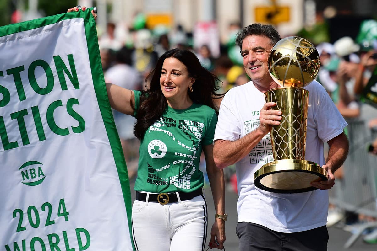 Boston Celtics majority owner Wyc Grousbeck holds the Larry OíBrien trophy prior to the Boston Celtics championship parade.