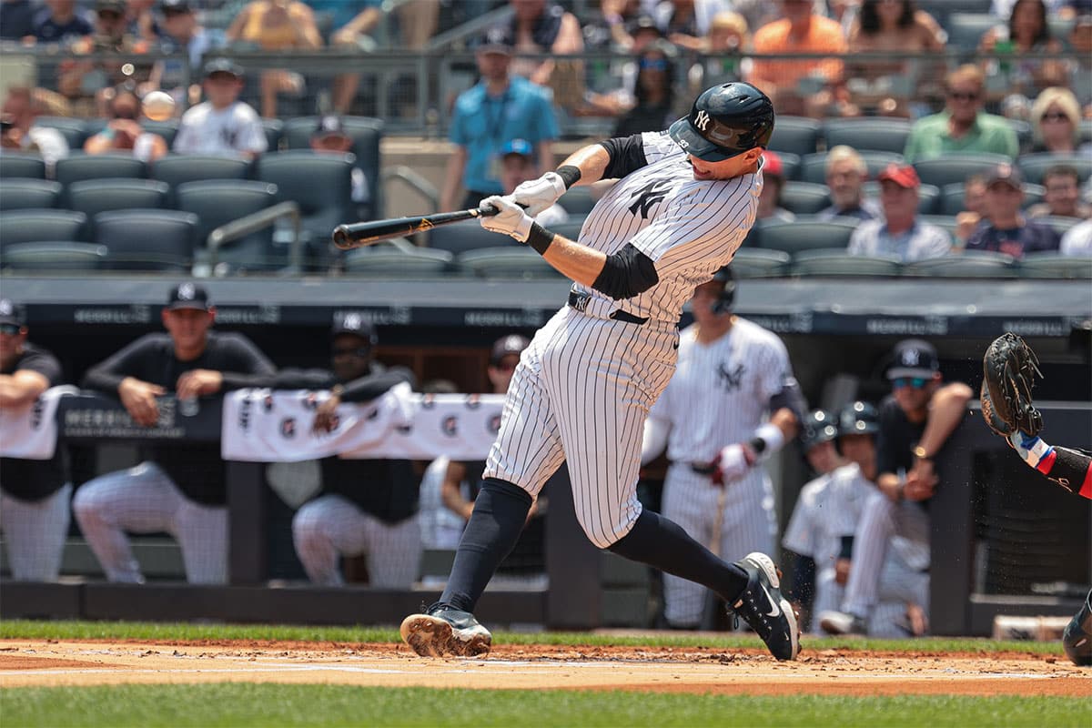 New York Yankees first baseman Ben Rice (93) hits a solo home run during the first inning against the Boston Red Sox at Yankee Stadium.