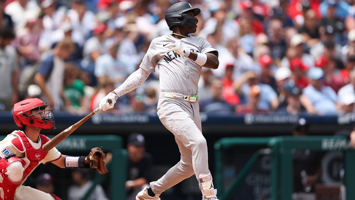 New York Yankees third base Jazz Chisholm Jr. (13) hits a single during the second inning against the Philadelphia Phillies at Citizens Bank Park.