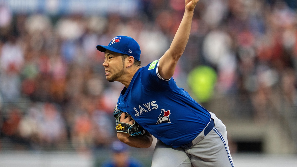 Jul 9, 2024; San Francisco, California, USA; Toronto Blue Jays starting pitcher Yusei Kikuchi (16) delivers a pitch against the San Francisco Giants during the first inning at Oracle Park. 