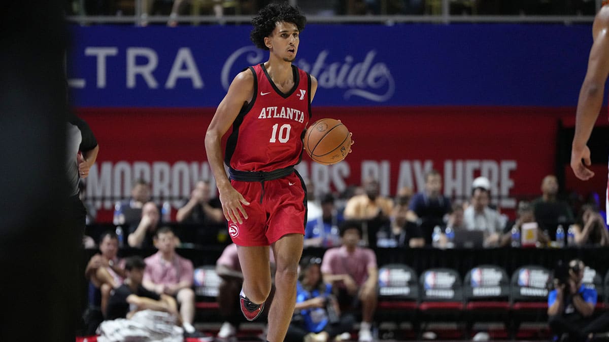 Atlanta Hawks forward Zaccharie Risacher (10) dribbles the ball against the Washington Wizards during the first half at Thomas & Mack Center.