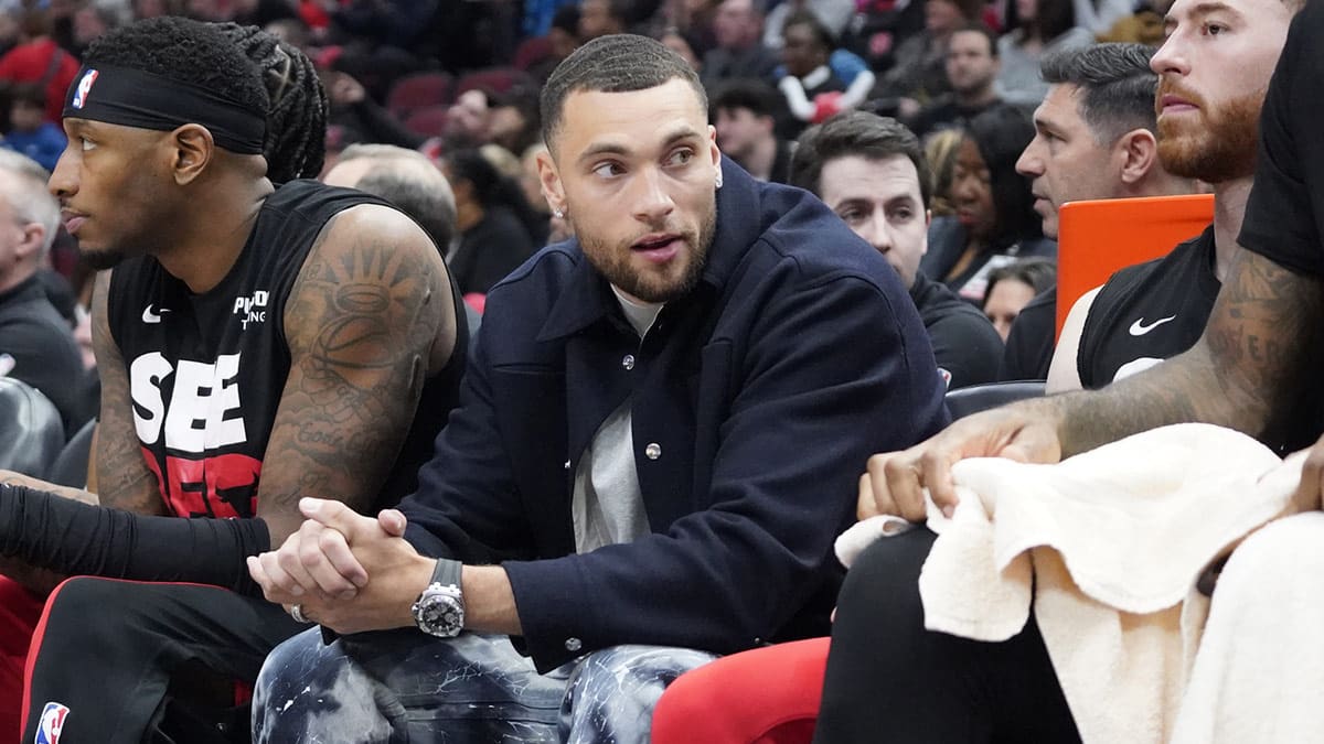 Chicago Bulls guard Zach LaVine (8) sits on the bench in street clothes during the first quarter at United Center. 