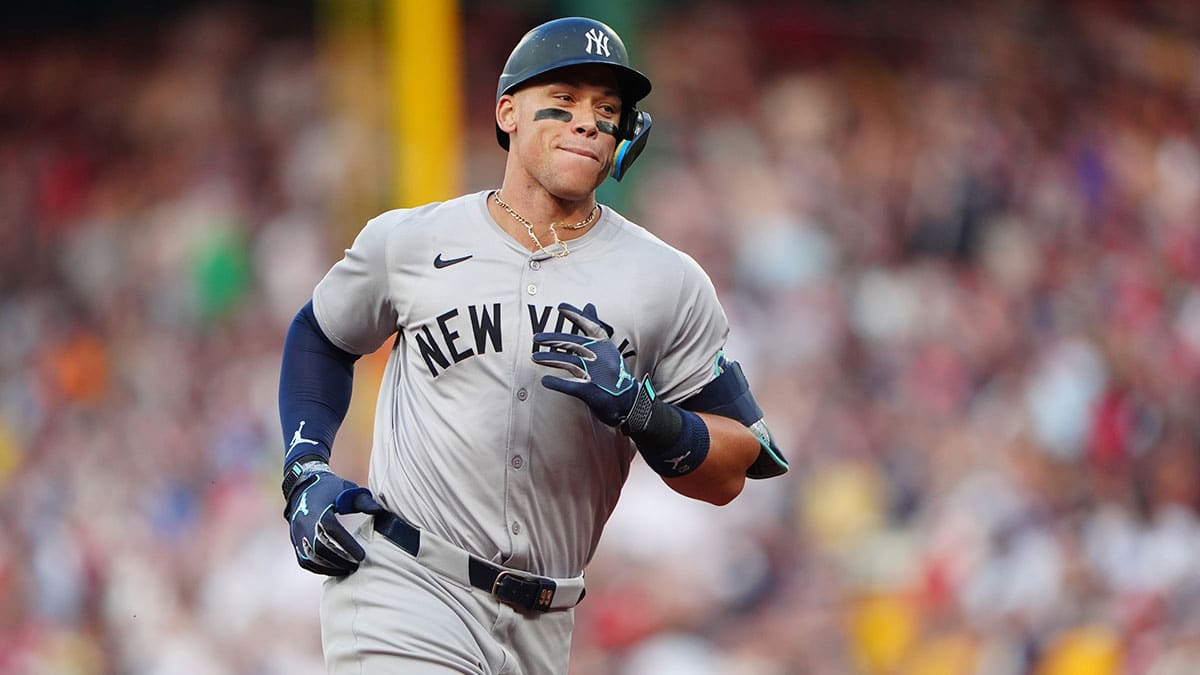 New York Yankees designated hitter Aaron Judge (99) rounds the bases after hitting a home run against the Boston Red Sox during the first inning at Fenway Park.