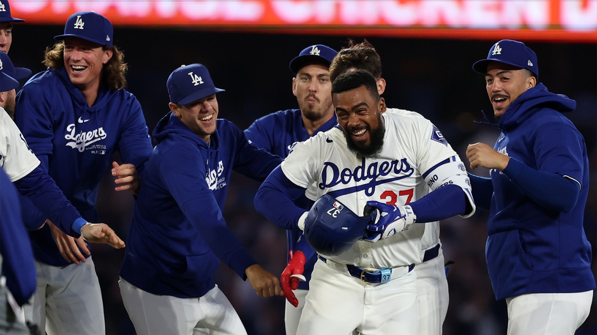 Los Angeles Dodgers left fielder Teoscar Hernandez (37) celebrates with teammates after hitting a walk off hit to defeat the Arizona Diamondbacks in bottom of the ninth inning at Dodger Stadium.