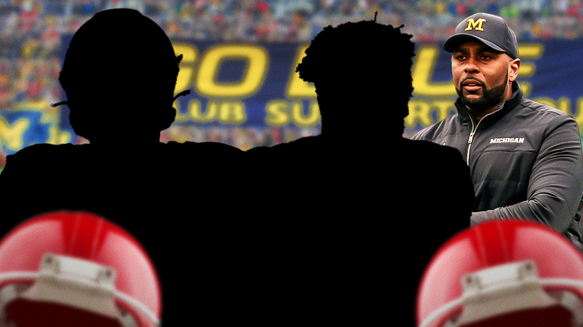 Mason Graham and Will Johnson as silhouettes. Sherrone Moore