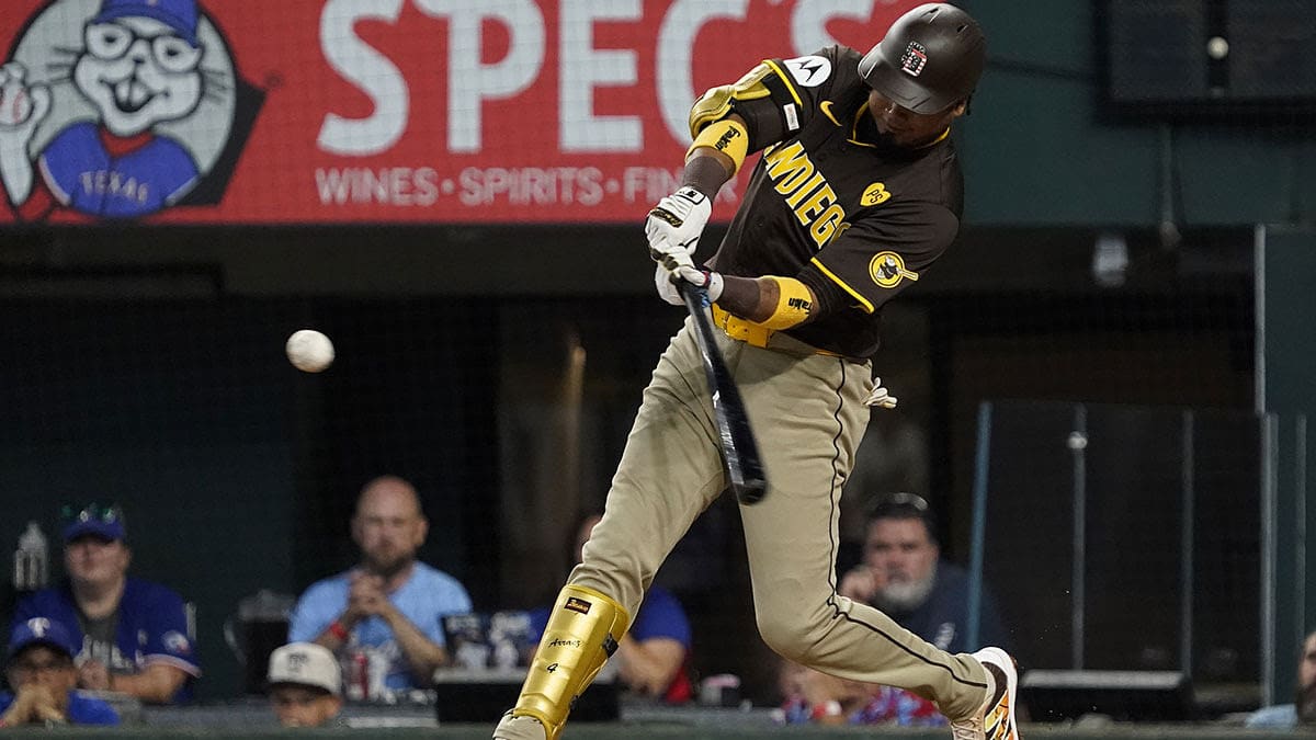 San Diego Padres second baseman Luis Arraez (4) hits a single during the third inning against the Texas Rangers at Globe Life Field.