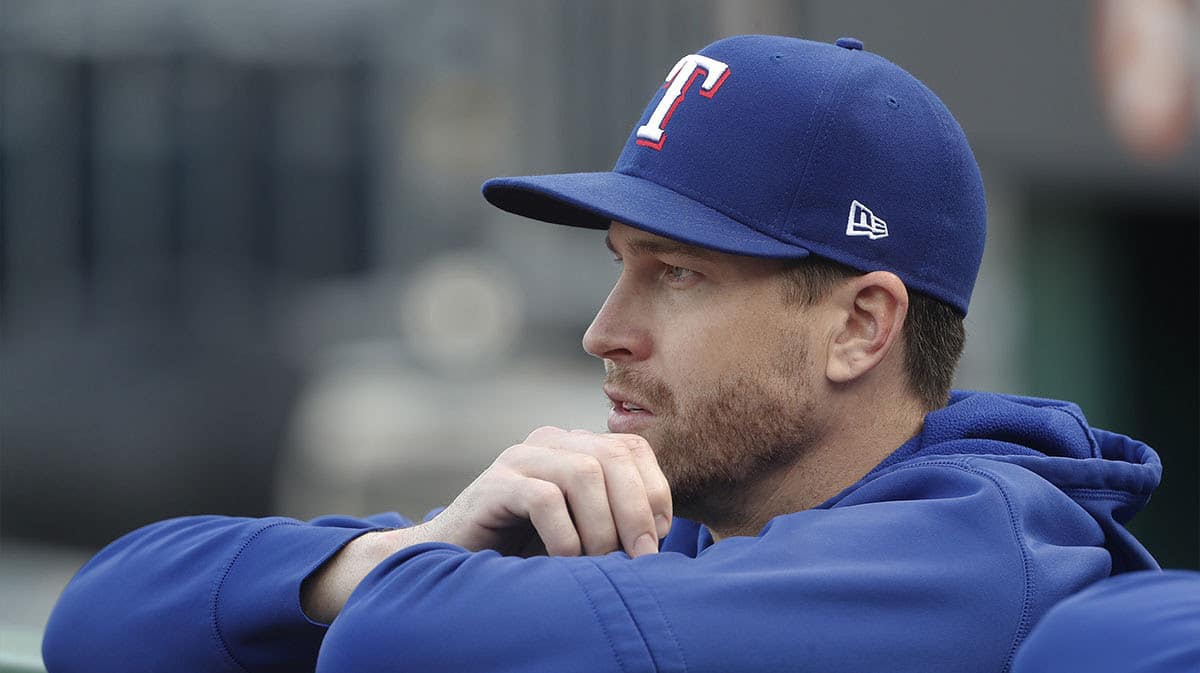 Texas Rangers pitcher Jacob deGrom (48) looks on from the dugout before the game against the Pittsburgh Pirates at PNC Park.