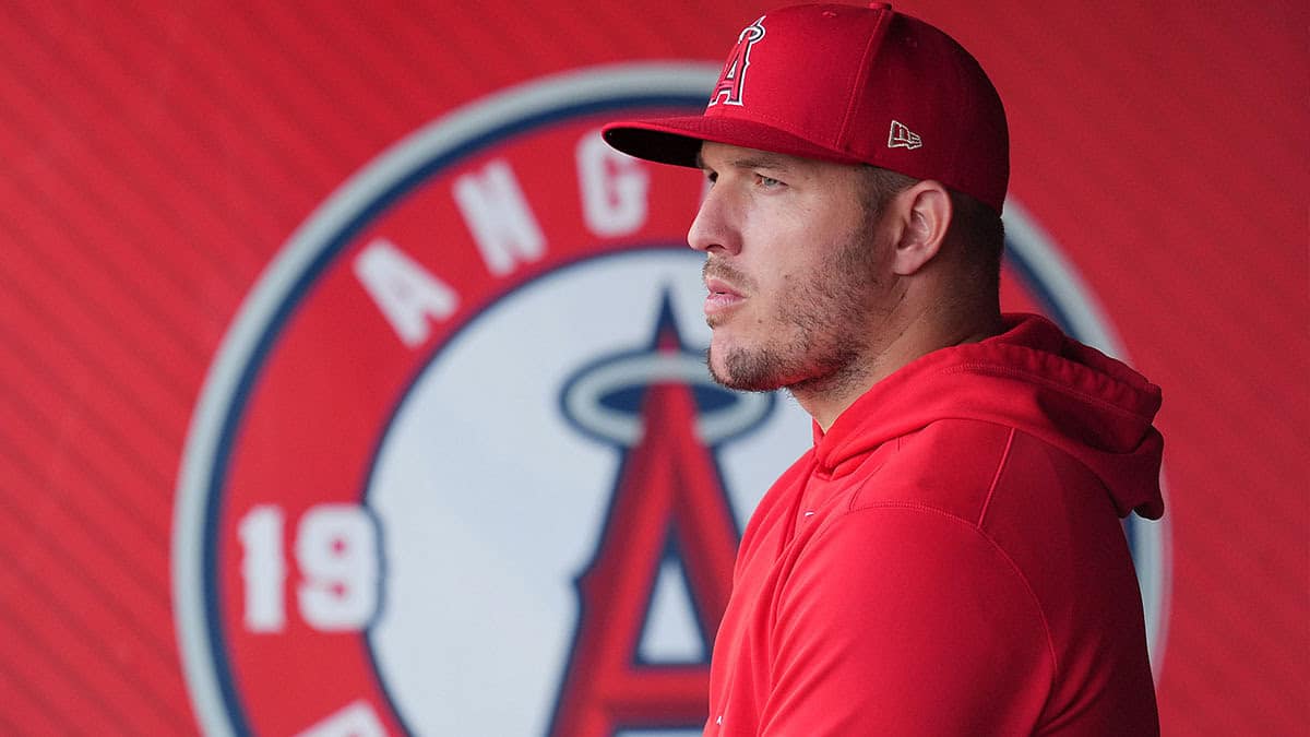 Los Angeles Angels center fielder Mike Trout watches from the dugout during a game against the Texas Rangers at Angel Stadium. 