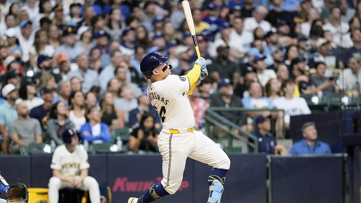 Milwaukee Brewers catcher William Contreras (24) hits a home run during the third inning against the Los Angeles Dodgers at American Family Field.