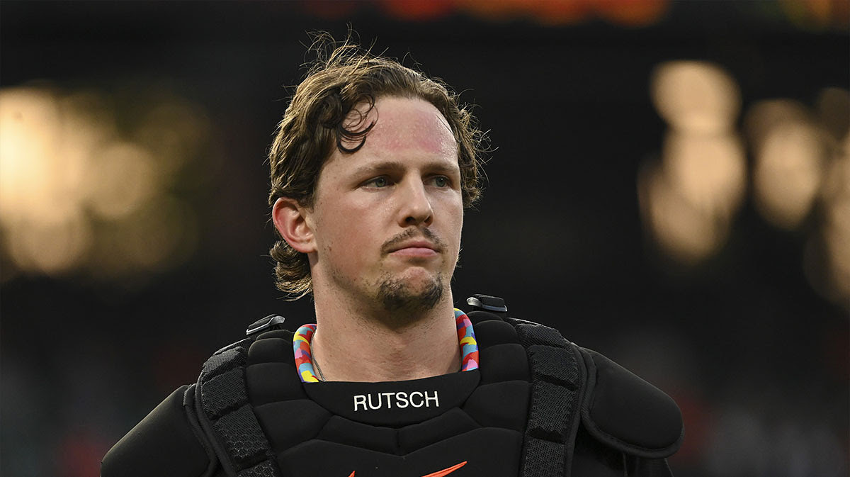 Adley Rutschman (35), catcher of the Baltimore Orioles, stands on the field during the third inning against the Washington Nationals at Oriole Park in Camden Yards.