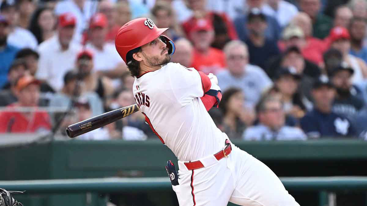 Washington Nationals center fielder Dylan Crews (3) watches the ball after hitting it into play during his first MLB at bat during the first inning against the New York Yankees at Nationals Park.