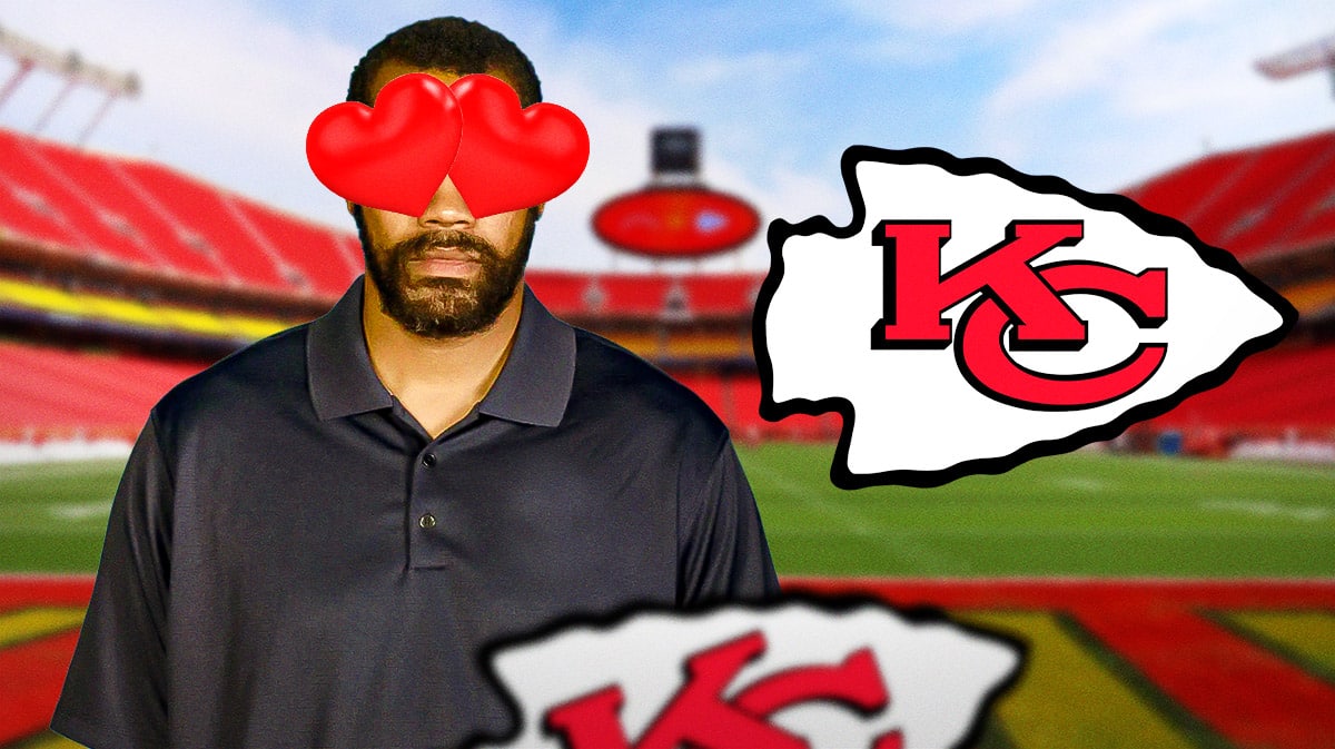 Rasheed Wallace looks at Chiefs logo with heart eyes