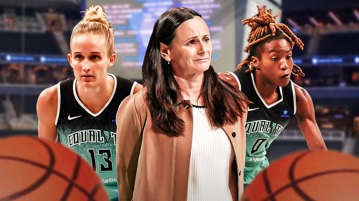 Sandy Brondello (Liberty) in center, Leonie Fiebich (Liberty) and Jaylyn Sherrod (Liberty) on either side of her. Barclays Center interior.
