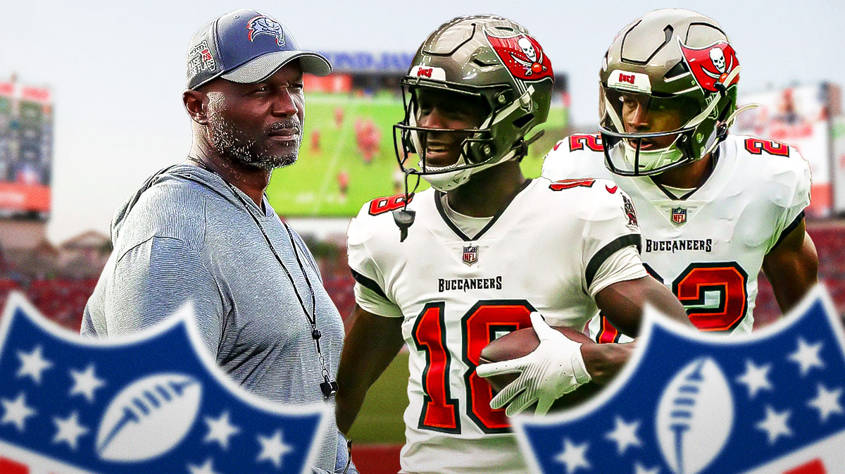 Tampa Bay Bucs head coach Todd Bowles looking down next to Buccaneers wide receiver Rakim Jarrett and running back Chase Edmonds