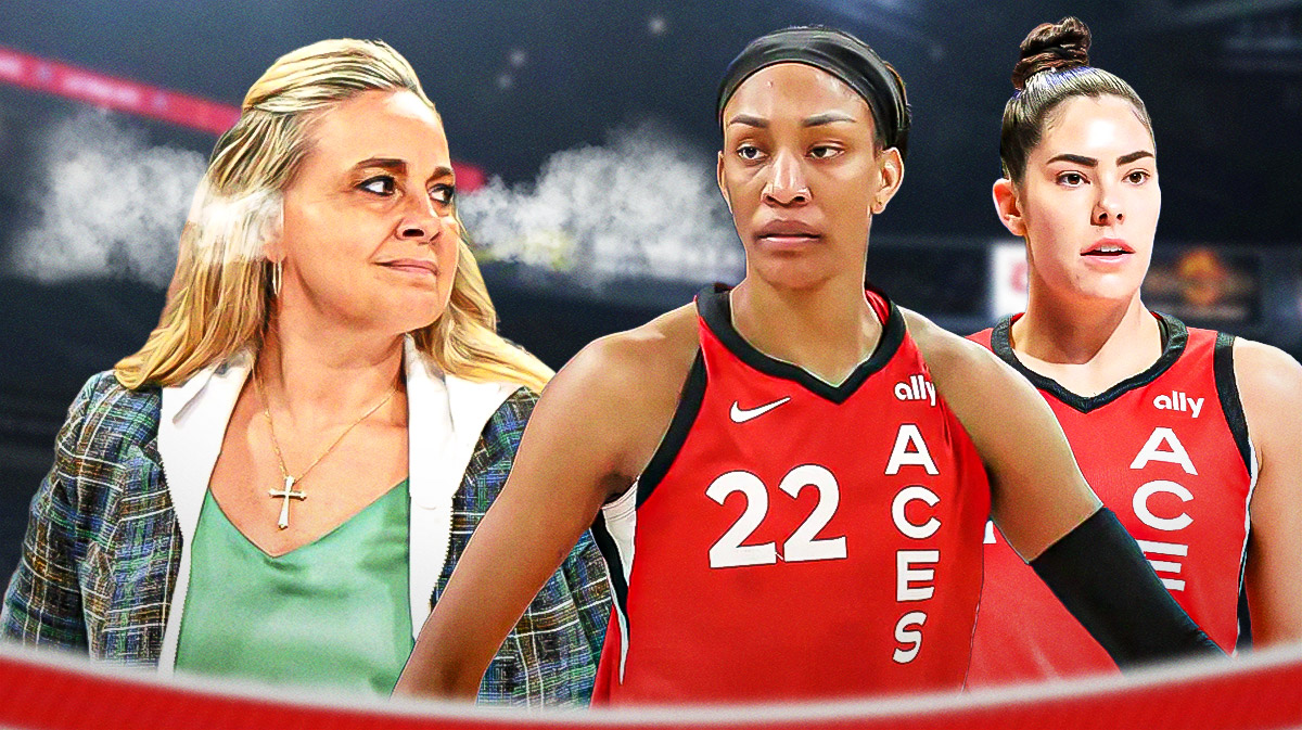 Aces Becky Hammon looking mad with steam coming out of her ears looking at A'Ja Wilson and Kelsey Plumb