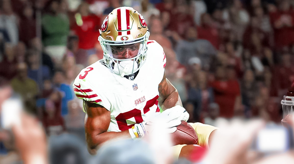 49ers Jacob Cowing next to some cool stuff
