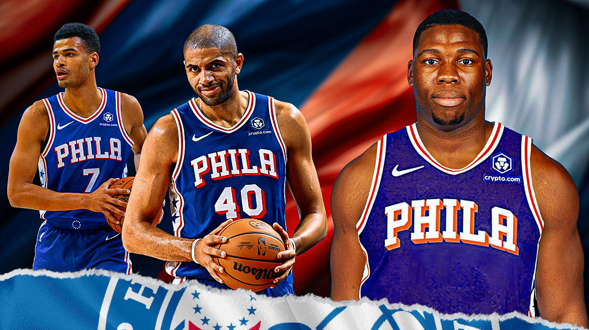 Guerschon Yabusele in 76ers uniform smiling, with France flag beside him, 76ers' Nicolas Batum and Timothe Luwawu-Cabarrot beside him as well