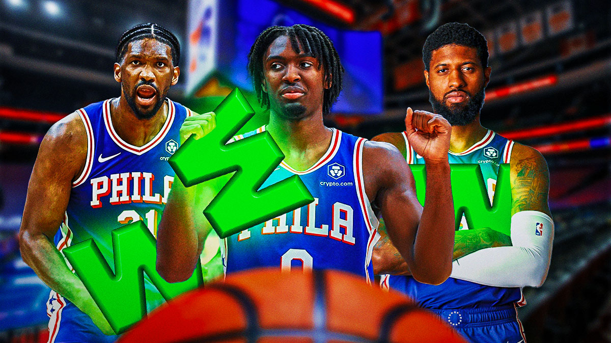 76ers' Joel Embiid, Tyrese Maxey and Paul George holding Ws