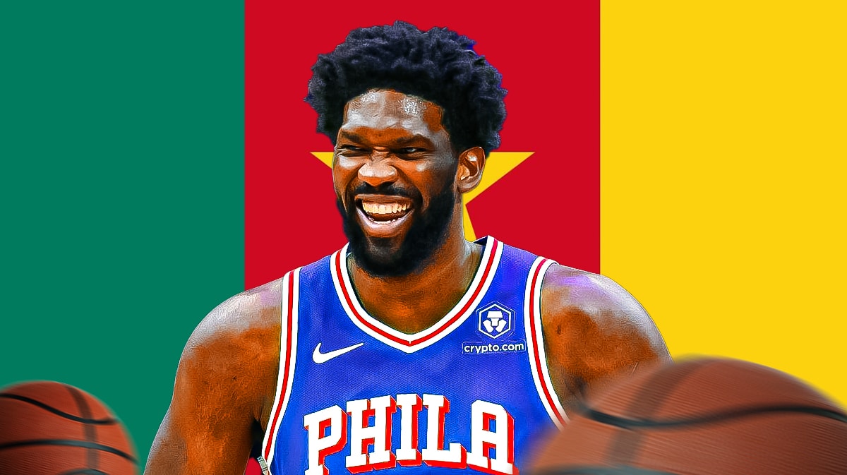 Joel Embiid in front of Cameron flag